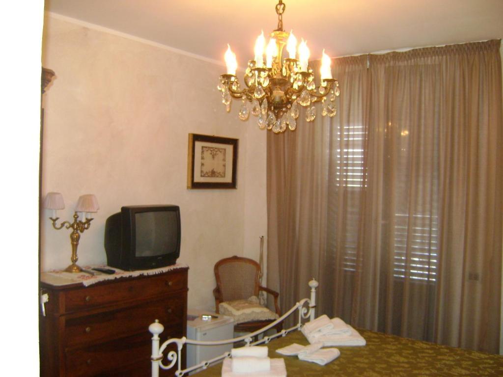 Hotel La Petite Maison Viareggio Pokoj fotografie